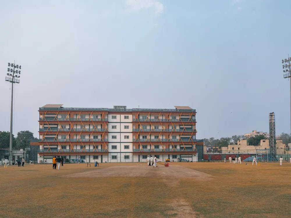 Cricket players on a sports ground in Delhi, India