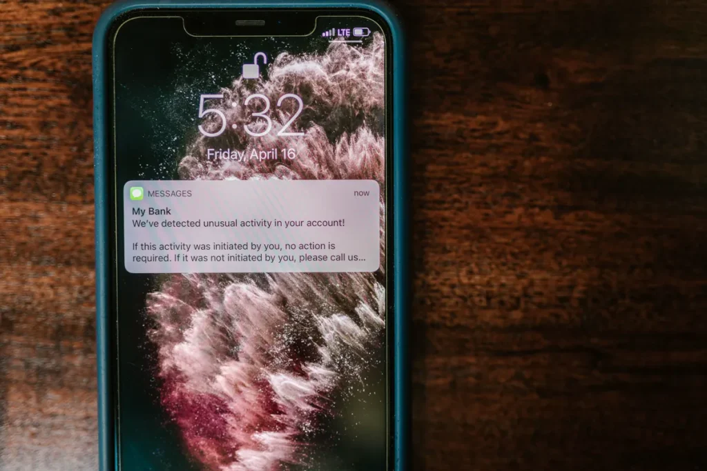Fraud alert on a smartphone illustrating suspicious-payment warnings